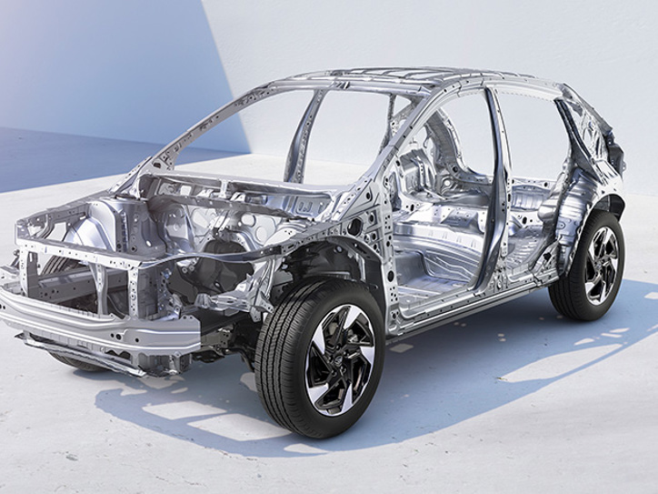 Iliustracija, rodanti Subaru Crosstrek saugos karkaso struktūrą, užtikrinančią didesnį saugumą susidūrimo metu.