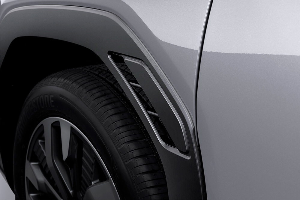 Aerodinaminis dizainas aplink Subaru ratų arkas – smulkios detalės, kurios sumažina oro pasipriešinimą ir prisideda prie mažesnių sąnaudų bei didesnio stabilumo važiuojant didesniu greičiu.